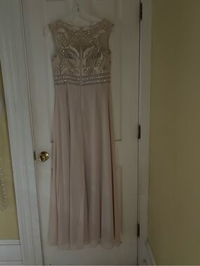 Champagne beaded evening gown with illusion neckline